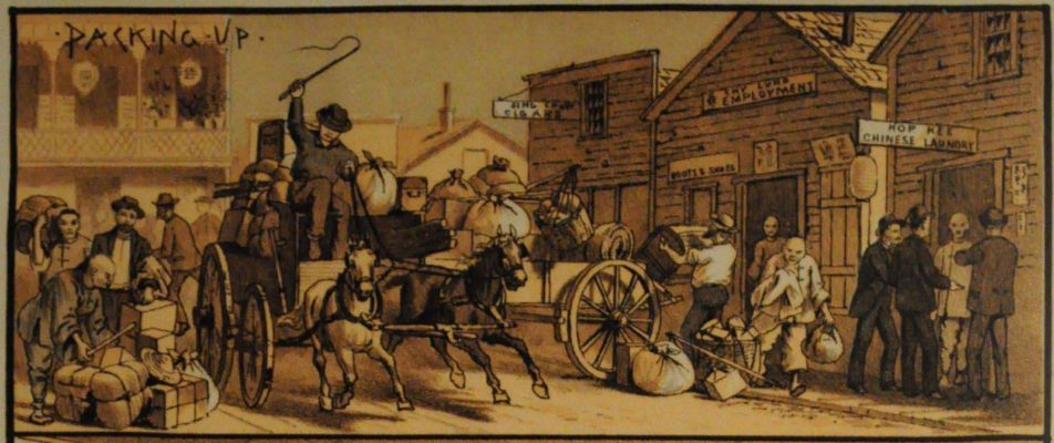 Engraving of a street of wooden storefronts with signs; men load bundles and trunks onto a horse-drawn wagon while Chinese residents stand among their belongings.